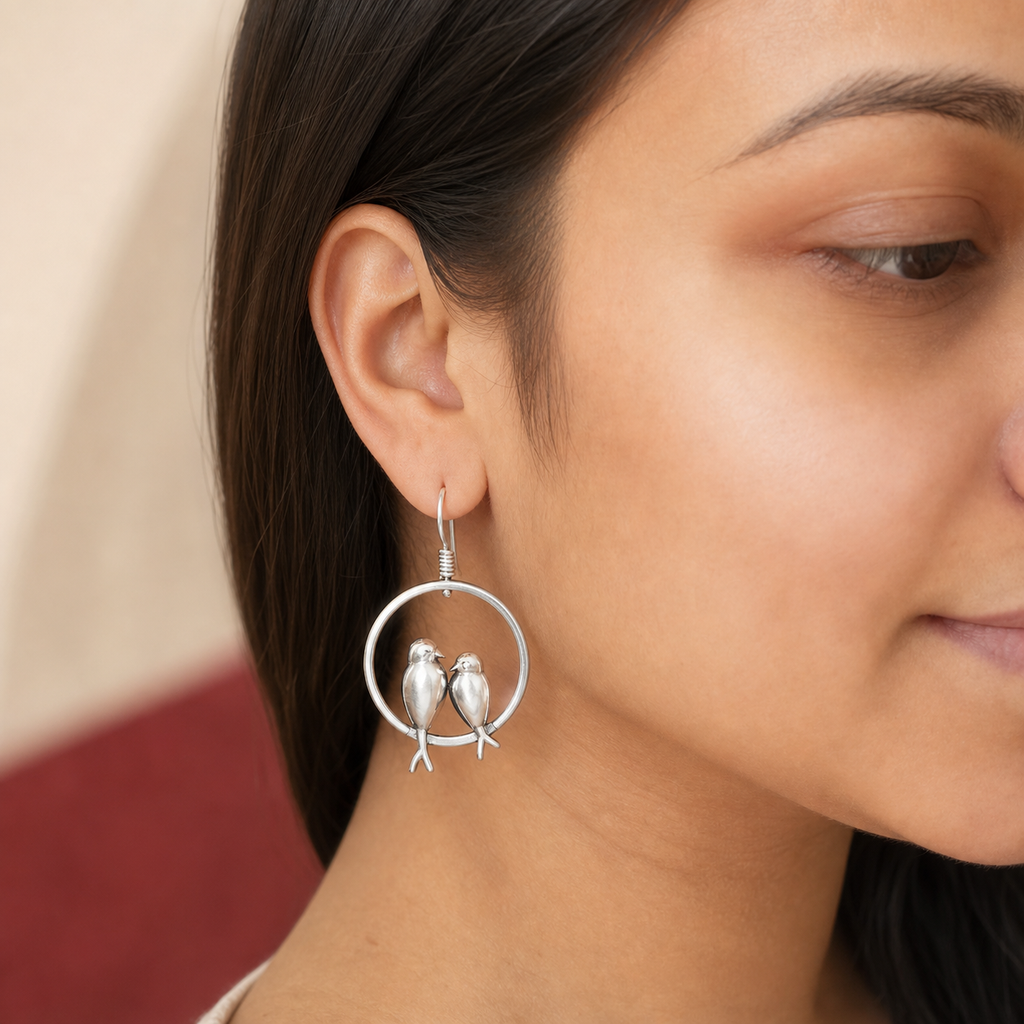 Do Panchi silver fishhook earring worn on the ear